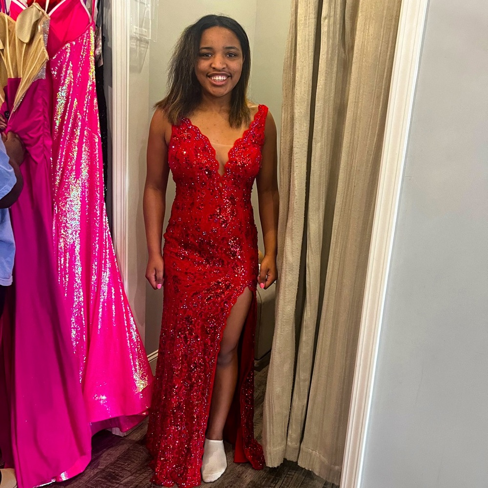 Beautiful red sequin prom dress with front slit